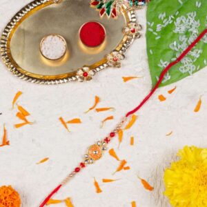 Delicate Orange Colour Enamel Rakhi with Greeting Card  for Brother & Gifting
