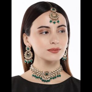 Gold Plated Studded Emerald Embellished Jewellery Set with Earrings and Maang Tikka for Women