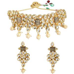 Gold tone Kundan Jewellery set embellished with pearls