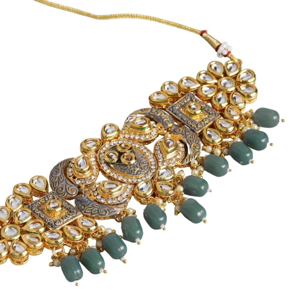 Gold toned Kundan and gray enamel Jewellery set -