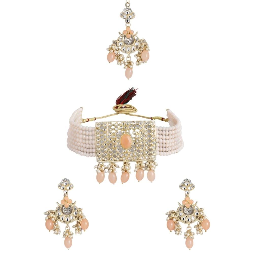 Accessher Gold toned Kundan and Pink enamel Jewellery set