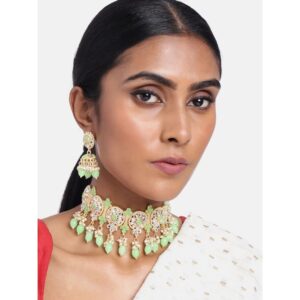 Gold toned Kundan choker jewellery set embellished with pearls and mint green beads