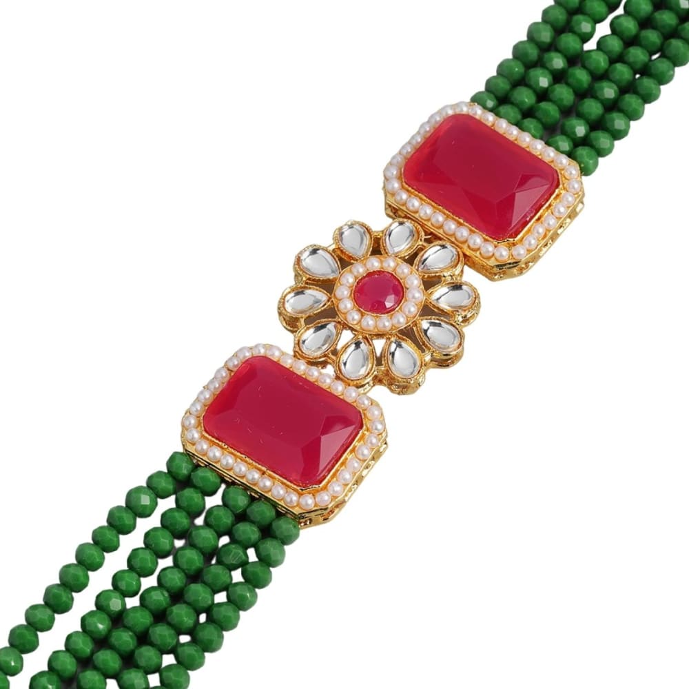 Gold toned emrald and ruby Kundan choker Jewellery set