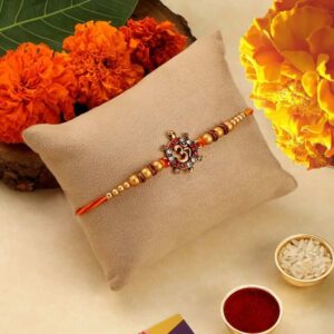 Religious Delicate Om Rakhi with Greeting Card for Brother & Gifting