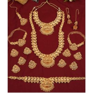 Set of 17 Gold Plated Ethnic Lakshmi Mata Motif Temple Bridal Jewellery Set with Necklaces, Earrings, Kamarbandh, Bajubandh, Maang Tika and Choti for Women