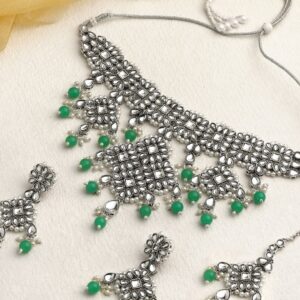 Dazzling Kundan Embellished Delicate Necklace Set with Green Dangle Earrings